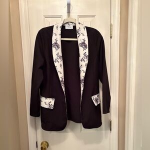Stylish Black Jacket with Patterned Trim NWOT